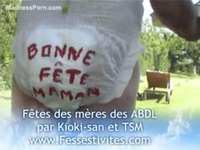 Submissive large dude in a gigantic adult baby diaper serving his slut outdoors